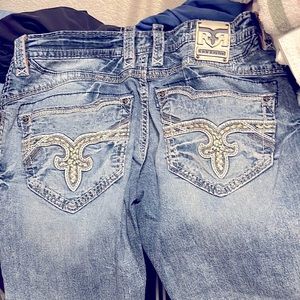 Men’s Rock revival boot cut jeans.